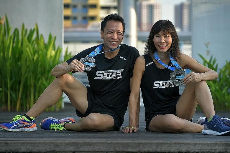 Andrew Cheong and Diana Lee with their Six Star Finisher medals. Lee, who started running marathons in 2009, had her first experience at the World Marathon Majors in Boston when supporting Cheong. She was so enthralled with the atmosphere that she de