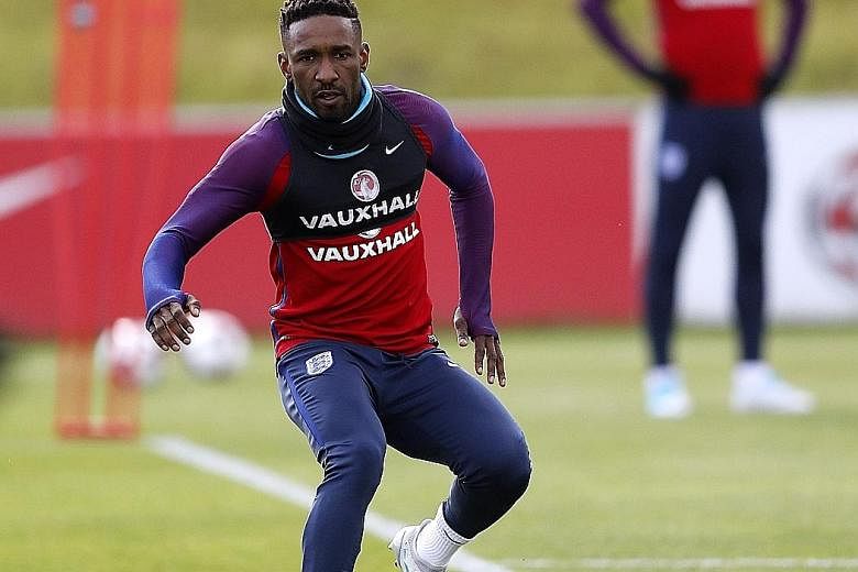 Striker Jermain Defoe trains ahead of England's World Cup qualifier against Scotland on Saturday.
