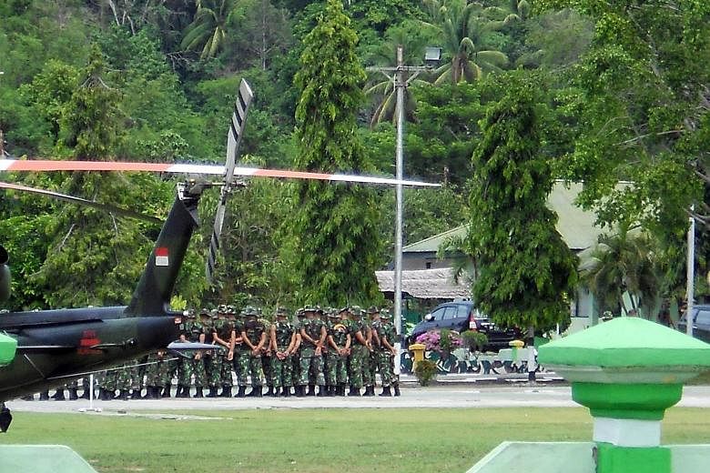 Indonesian troops arriving in Poso, Central Sulawesi, to join the manhunt for Santoso, the country's most wanted terrorist, in January last year. Santoso had evaded the police for months until soldiers killed him in a gunfight last July. This helped 