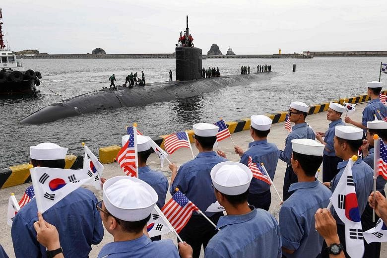 Professor Yang Moo Jin of the University of North Korean Studies said the latest missile test may be Pyongyang's way of expressing displeasure over the arrival of the 6,900-ton USS Cheyenne submarine (above) in the South Korean port of Busan on Tuesd