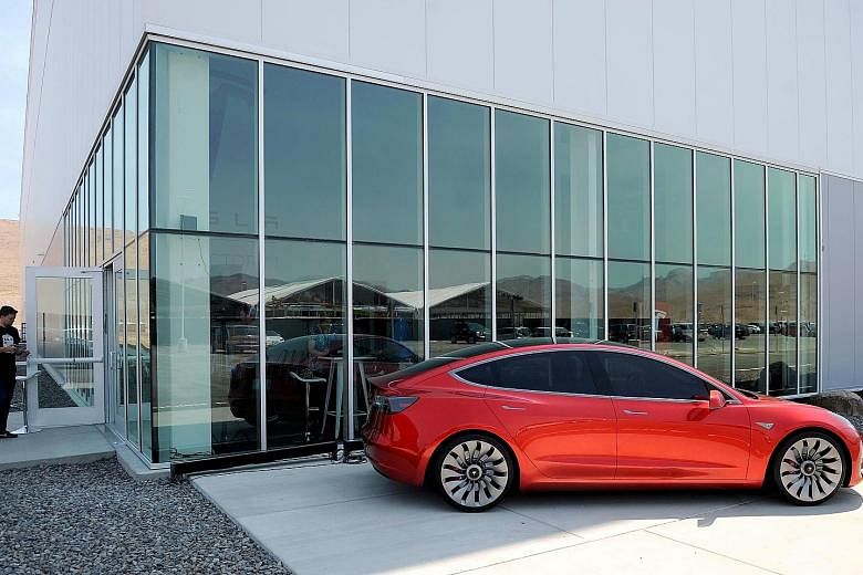 Tesla Model 3 customers can choose the car's colour and size of its wheels and eventually choose between two motors - one designed for highway travel and another for stop-and-go traffic.