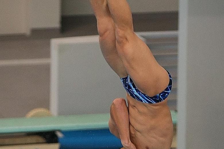 Timothy Lee on his way to the 3m springboard title, to add to his golds in the 1m springboard and 3m synchronised springboard. His twin and three others will join him in Hungary.