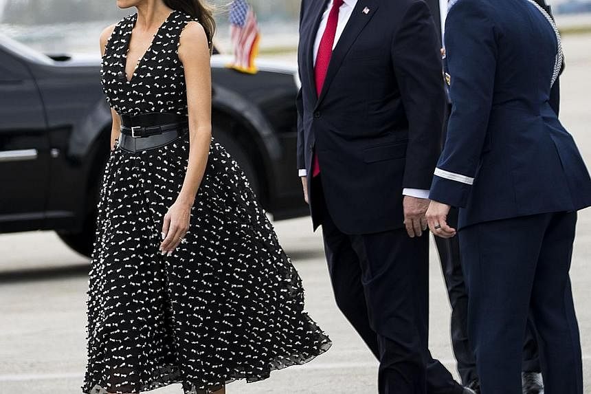 President Donald Trump and First Lady Melania Trump at Palm Beach International Airport in West Palm Beach, Florida, in April. The Politico news website reported that Mrs Trump and their young son Baron will be moving into the White House on Wednesda