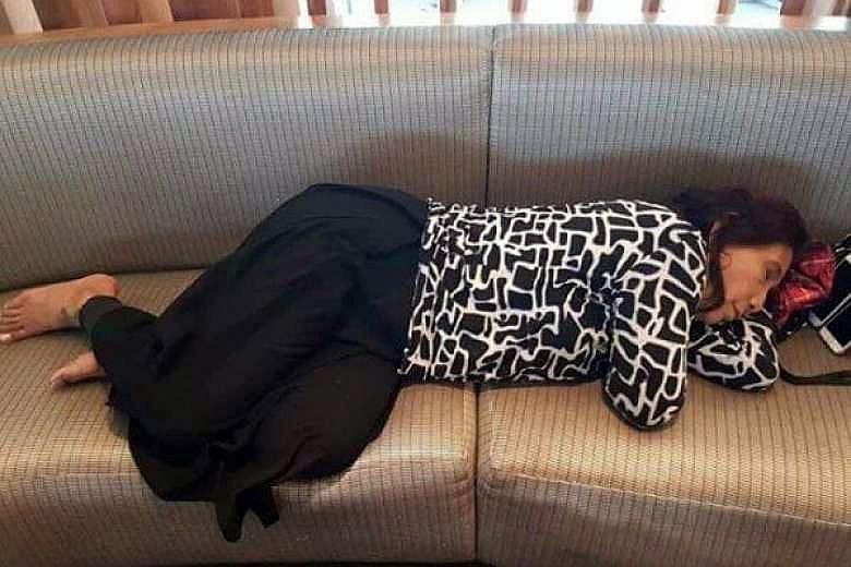 Indonesia's Maritime and Fisheries Minister Susi Pudjiastuti sleeping on a couch in a VIP lounge of John F. Kennedy Airport in New York. The picture went viral on social media yesterday and won her praise for being a "super woman".