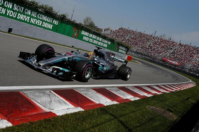 Lewis Hamilton leading the Canadian Grand Prix on Sunday, en route to his sixth victory in 10 years at Montreal. His victory at the Circuit Gilles Villeneuve cut Sebastian Vettel's world championship lead from 25 points to 12.