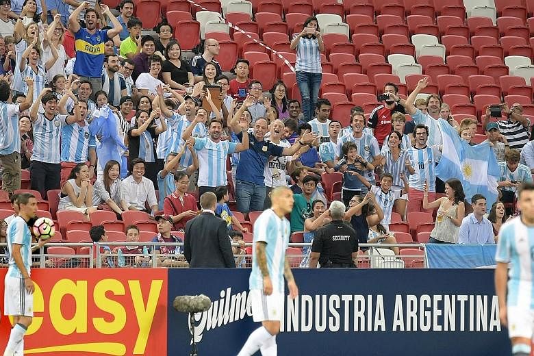 Argentina fans cheering on their side as the world No. 2 team swatted aside the 157-ranked side in a marquee friendly marking the 125th anniversary of the founding of the Football Association of Singapore.