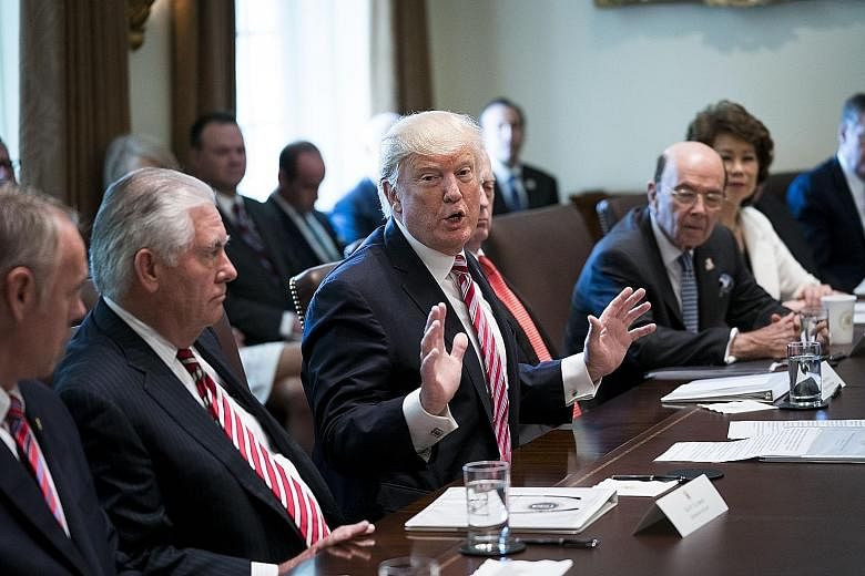 US President Donald Trump meeting members of his Cabinet in the White House Cabinet Room on Monday. Most of them sung praises of the commander-in-chief. Mr Trump himself indulged in a big of self-congratulation, declaring himself one of the most prod