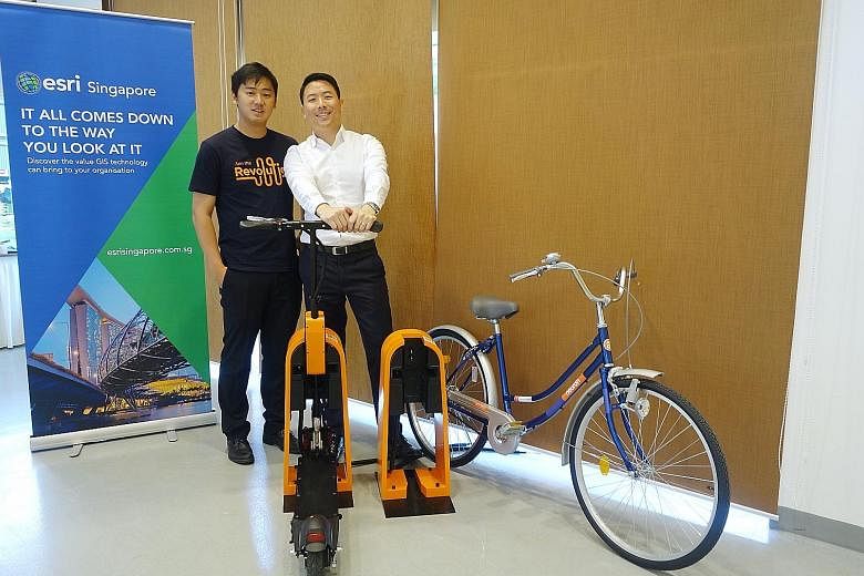 Neuron Mobility founder Zachary Wang (left) and Esri Singapore CEO Thomas Pramotedham. Mr Wang said the Esri Start-up Programme has provided his firm with a full-suite software platform as well as professional support, which a start-up would typicall