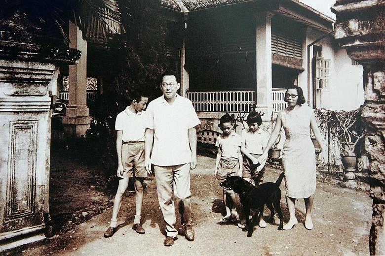 The young Lee siblings with their parents, Mr Lee Kuan Yew and Madam Kwa Geok Choo, at their home at 38, Oxley Road, which is at the centre of the dispute. The late Mr Lee stated in his will that he wished for the house to demolished.