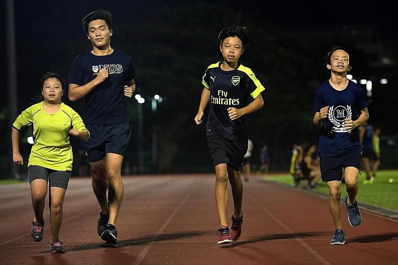Kurt Lium (third from left), 15, training with fellow athletes Sarah Tan, 19, Mark Goh, 25, and a friend, Yeo Sheng Xun (right), 18. Sheng Xun is also a transplant patient but will not be going for the World Transplant Games in Spain later this month