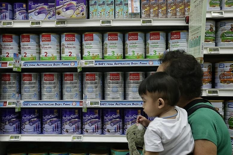 Australia's Own infant formula for sale at AMK Hub's FairPrice Xtra supermarket. It is priced at between $27.50 and $35 for a 900g tin, lower than the average price of $56.06.