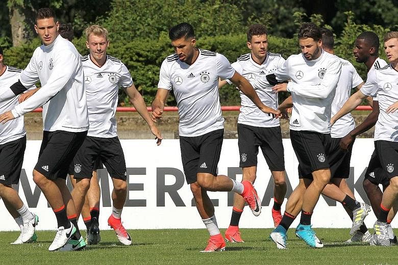Germany's players at a training session in Keltersbach, near Frankfurt, on Tuesday. Coach Joachim Low says his focus is long-term and that he aims to strengthen his squad for next year's World Cup.