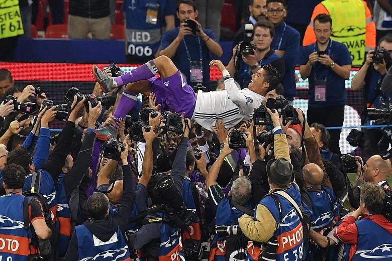 Real Madrid forward Cristiano Ronaldo celebrating after winning the Champions League final against Juventus on June 3. Should Ronaldo choose to leave Real, only top-tier clubs with deep pockets like Manchester United or Paris Saint-Germain will be ab