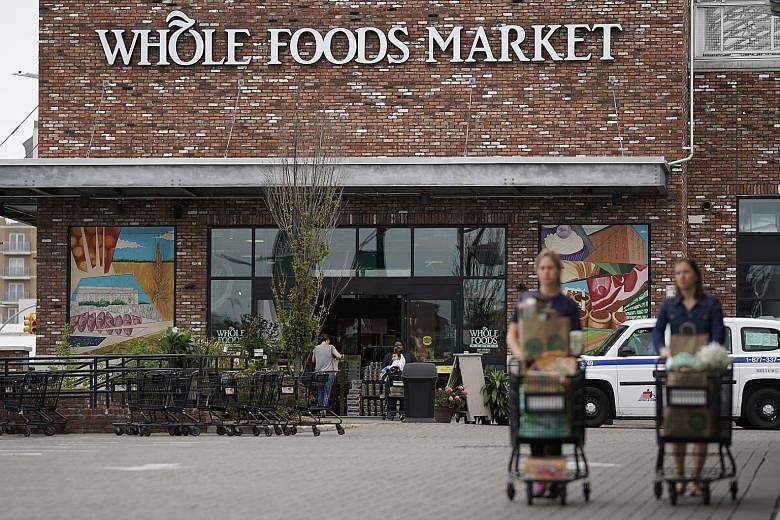 Online retailer Amazon's surprise US$13.7 billion (S$18.9 billion) acquisition of supermarket chain Whole Foods last week rattled stocks of United States retailers and food companies such as Walmart, Target, Kroger and Costco, wiping billions of doll