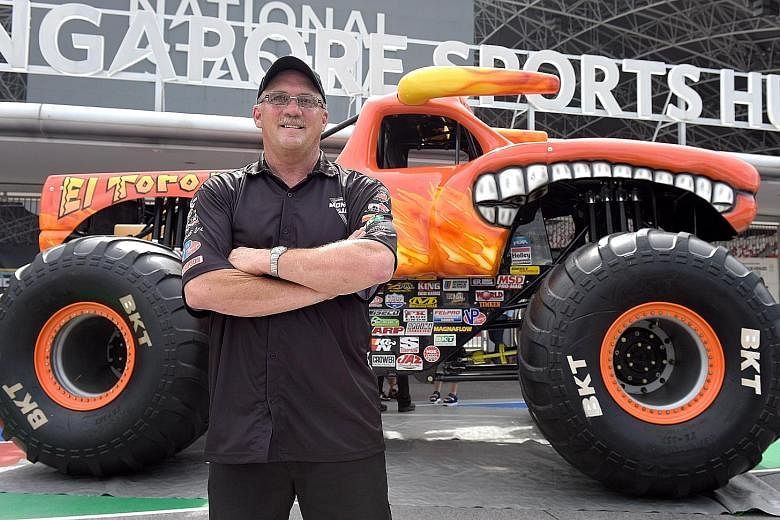 Truck driver Dan Evans competes in Monster Jam, a motorsport event originating from the United States.