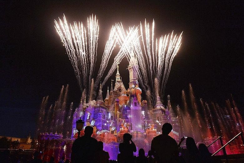 Visitors at an event marking the first anniversary of the opening of Shanghai Disneyland.