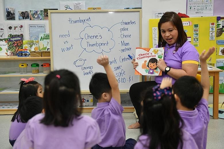 Pupils from Cherie Hearts @ Upper Thomson at the pre-school's financial literacy class. They can clearly understand the concepts taught and are happy to put into practice what they learn, said branch director Ong Yen Lyn. Pre-schoolers at Dreamkids g