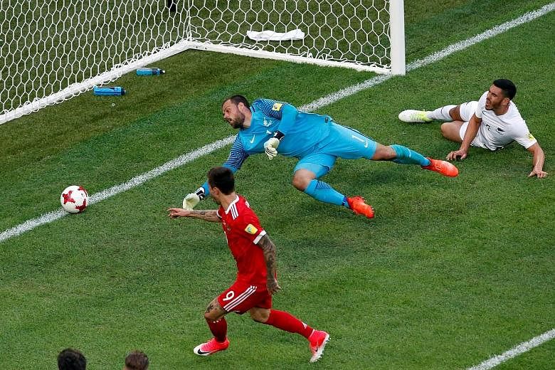 Russia's Fedor Smolov scoring his team's second goal against New Zealand in the opening match of the Confederations Cup on Saturday. The match ended 2-0 in favour of the Russians and they will face a tougher test against Euro 2016 champions Portugal 