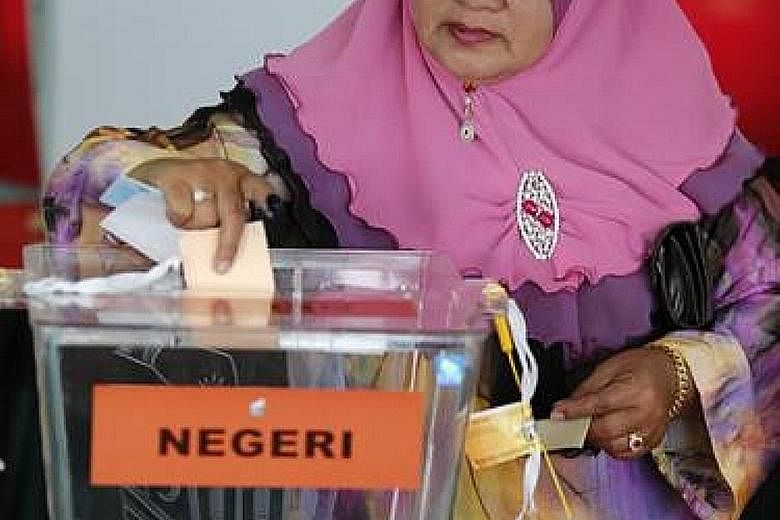 Race appears to affect how Malaysians express concerns about the economy at the ballot box.