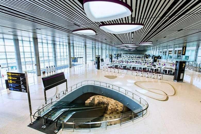 The departure hall (above) and departure transit area (below, right) were some of the areas revealed on Changi Airport's Facebook page on Monday.