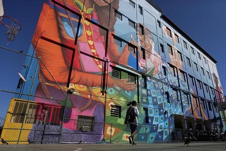 A mural entitled Cuentos (Stories) by Brazilian artist Luna Buschinelli on a public school wall adds a large dose of vibrancy to this Rio de Janeiro area. The 2,500 sq m work has been recognised by the Guinness Book of Records as the biggest work of 