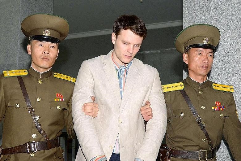 University of Virginia student Otto Warmbier on his way to court in Pyongyang in this photo released by Kyodo news agency in March last year. He was sentenced to 15 years of hard labour for stealing a political poster.