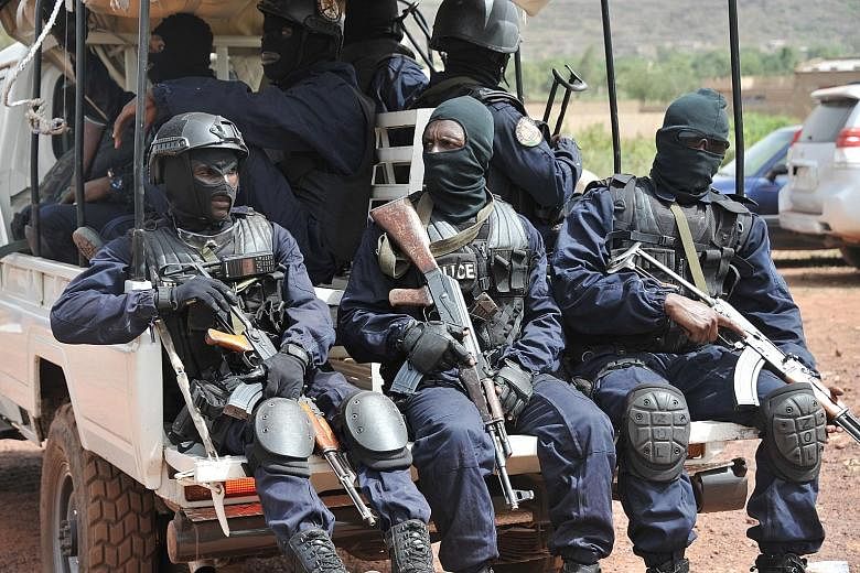 Malian anti-terrorist special forces arriving at the Kangaba tourist resort in Bamako on Monday, a day after gunmen stormed the resort, briefly seizing more than 30 hostages and leaving at least two people dead. Four assailants were killed by securit