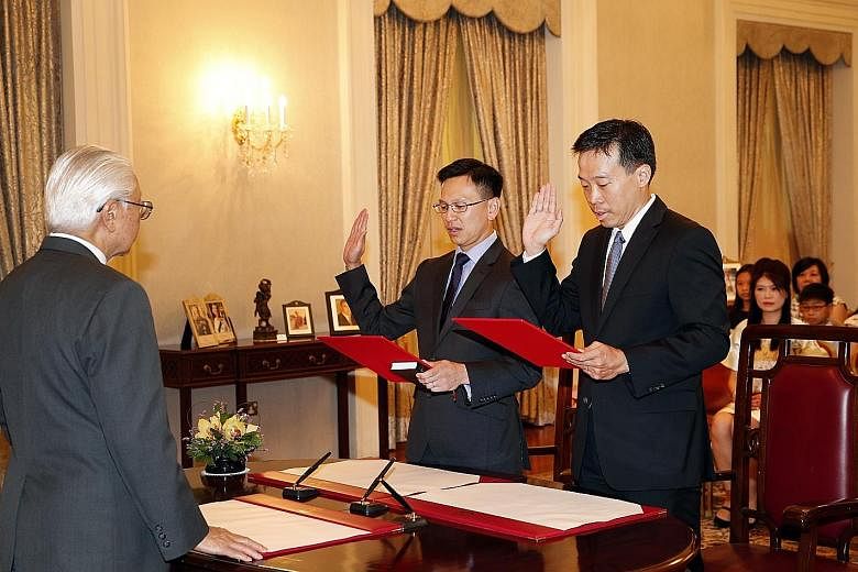 President Tony Tan Keng Yam yesterday officiated at the Swearing-in and Appointment Ceremony of Mr Png Cheong Boon (far right) as the Second Permanent Secretary for the Ministry of Trade and Industry, and Mr Lai Chung Han as the Second Permanent Secr