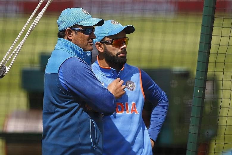 Former India coach Anil Kumble (left) with captain Virat Kohli during training at the ICC Champions Trophy. Kohli had criticised Kumble's leadership style after India lost the Champions Trophy final to Pakistan on Sunday.