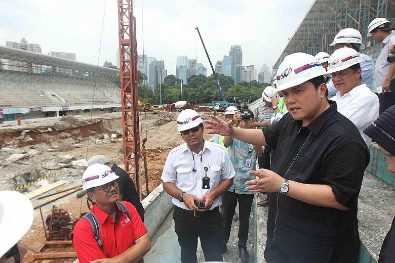 Erick Thohir (right), chairman of the Indonesia Asian Games Organising Committee, inspecting the progress of the construction of a new aquatic stadium in the Gelora Bung Karno Complex.