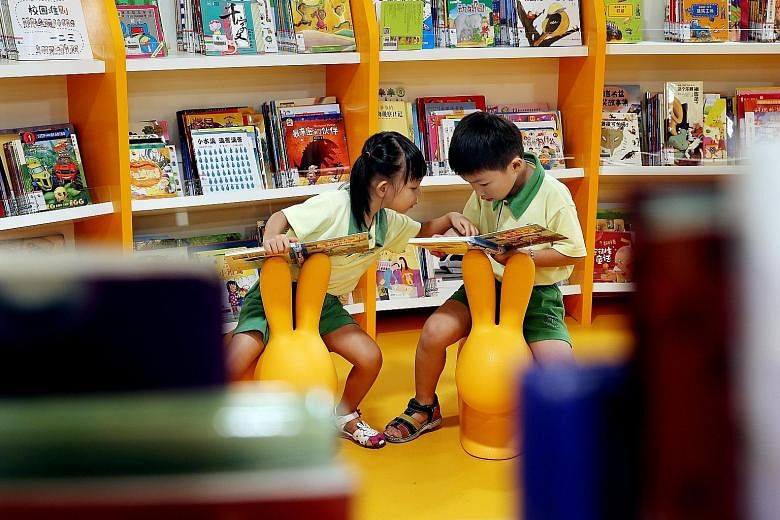 Bukit Panjang Public Library's redesigned children's space boasts a multimedia storytelling room that uses images, light and sound effects to create interactive sessions.