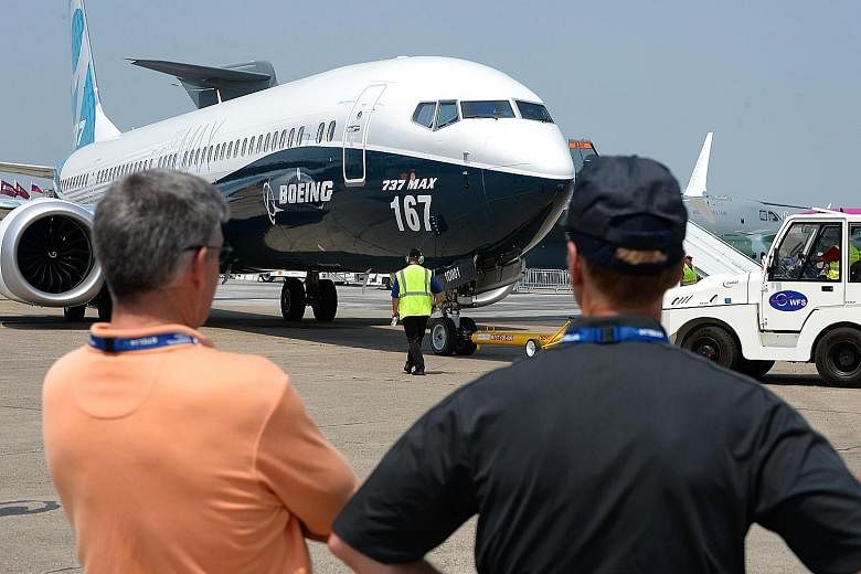 A Boeing 737 MAX 9 on the tarmac prior to performing in a flying display on Wednesday during the Paris Air Show. The total haul of about US$83 billion in deals at this year's show easily surpassed the US$50 billion signed at last year's show in Farnb