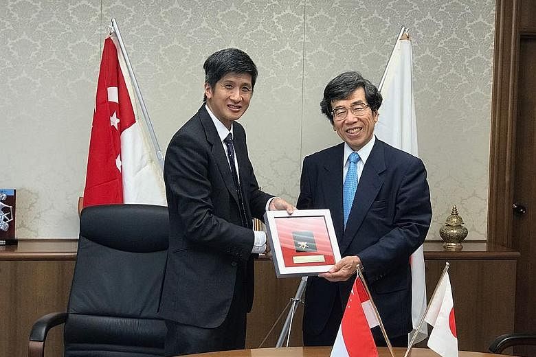 CCS' Mr Toh Han Li (left) and Japan Fair Trade Commission chairman Kazuyuki Sugimoto concluded the memorandum of cooperation in Tokyo yesterday.