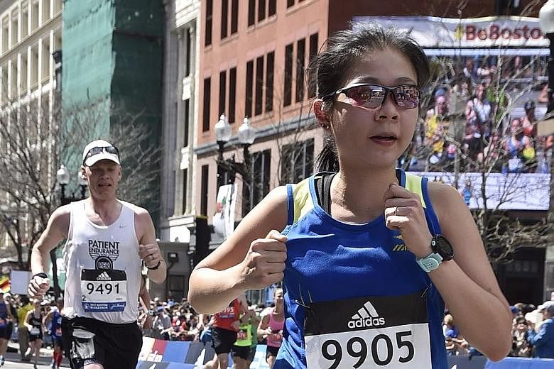 Aileen Tan running in the 2017 Boston Marathon. She used a specific approach while preparing for the event, using routes with many slopes so that she would adapt to the terrain of the Boston event.