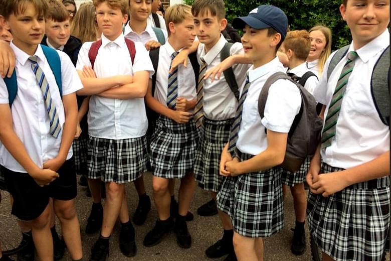 Dozens of schoolboys at the Isca Academy in Britain have gone to class wearing girls' uniform skirts when the head teacher would not relax the dress code banning the more suitable option: shorts.