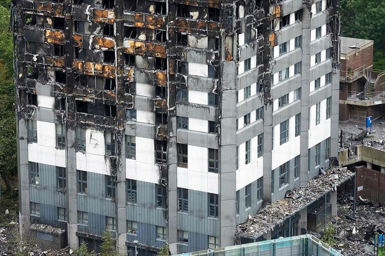 (Left) The burnt-out upper floors at what remains of the Grenfell Tower block in west London stand in stark contrast to the lower floors with the cladding still intact. The cladding has been found to be combustible, as Londoners demand justice for th
