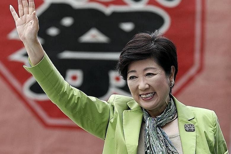 Tokyo governor Yuriko Koike on the campaign trail yesterday. She is leading her new Tomin First no Kai (Tokyoites First) party into the contest for the Tokyo metropolitan assembly.