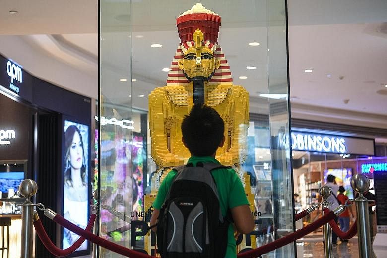A Lego replica of part of Egypt's Great Temple at Abu Simbel on display at Raffles City mall yesterday. The replica is part of the Piece of Peace World Heritage Exhibit, a travelling exhibition featuring world heritage sites - such as the Taj Mahal i