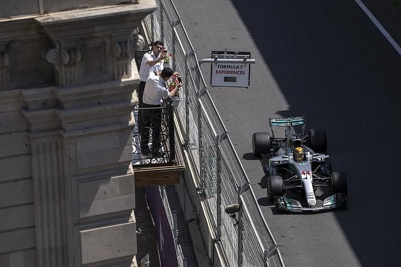 Lewis Hamilton produced a masterful last-gasp lap in qualifying to beat team-mate Valtteri Bottas to pole position for the Azerbaijan Grand Prix. The Ferraris will start on the second row of the grid today.