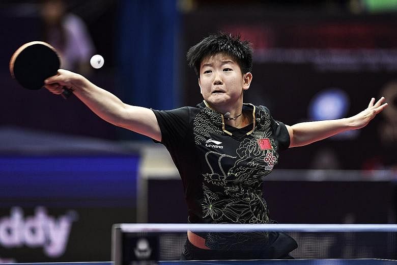 Sun Yingsha returning the ball to Feng Tianwei (not pictured) during the quarter-finals of the China Open yesterday. Sun won in straight sets.