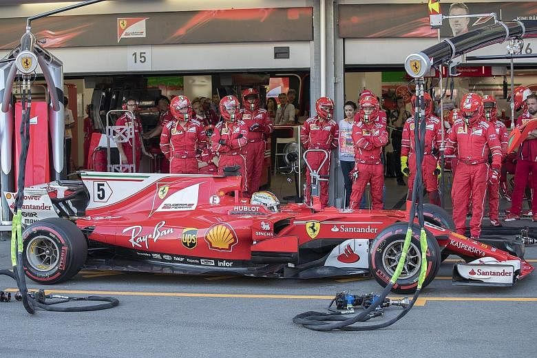 Vettel waiting out a 10-second stop-go penalty for dangerous driving at the Azerbaijan Grand Prix.