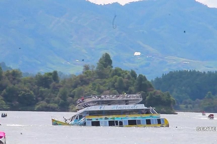 The authorities in Guatape, Colombia, said the boat was carrying 170 people, most of whom were rescued by other boats or escaped by themselves. One helicopter from the air force and two from the army were sent to help in rescue operations.