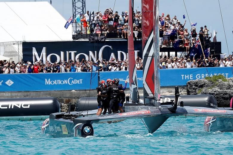 Team New Zealand celebrate after upsetting defending champions United States 7-1 to take the America's Cup on Monday, putting to rest their devastating 2013 loss to the Americans.