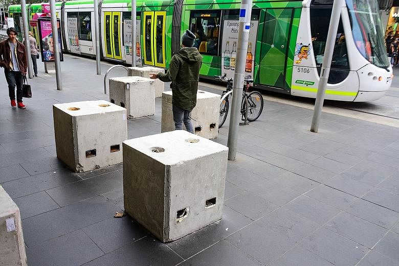 Bourke Street is one of nine locations in Melbourne's city centre where concrete blocks have been put up. In January, a man drove a car onto this street, killing six people and injuring more than 30.