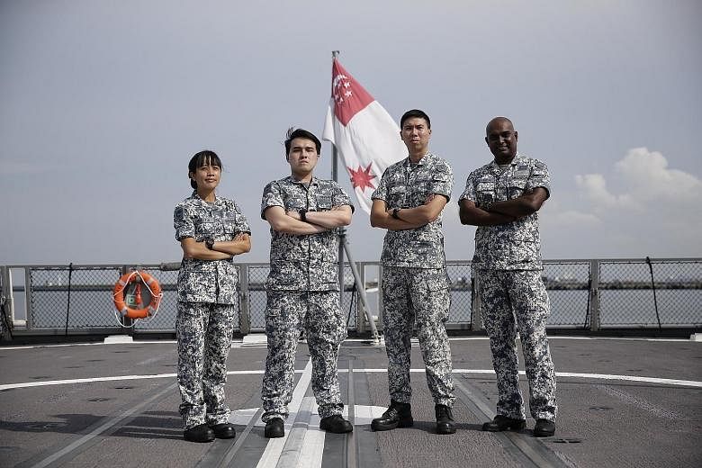 From left: ME2 Winnie Lai, CFC (NS) Jason Koh, Commanding Officer LTC Edwin Chen and ME3 D. Vijayan (Coxswain) are part of the RSS Steadfast crew, which won the Best Fleet Unit award. LTC Ng Kiang Chuan (red beret) with some commandos taking part in 