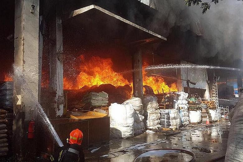 The two Chinese workers suffered 66 per cent and 90 per cent burns respectively to their bodies. The fire, which involved scrap metals and plastic materials, broke out at a warehouse at 28, Tuas Avenue 10 last week.