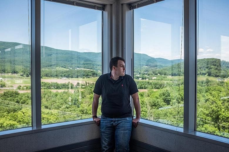 IBM computer security analyst Sean Bridges at the firm's campus in rural Rocket Center, West Virginia. He is one of IBM's increasing number of new hires who do not hold a college degree.