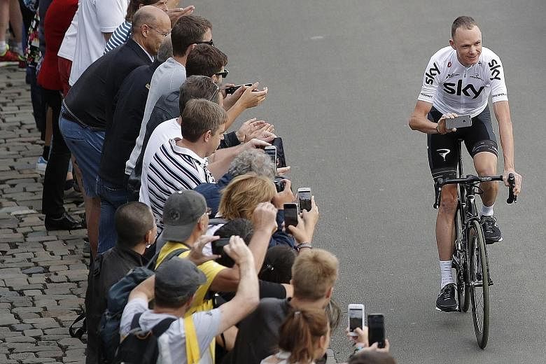 Chris Froome of Team Sky riding during the parade at the opening ceremony of the Tour de France in Dusseldorf.