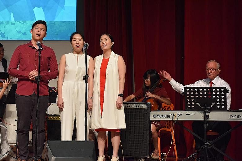 Members of the Singapore Pocket Opera Theatre (from left) Jeremy Koh, Charmaine Tan and Evelyn Ang performing NS50 tribute song Did You Ever Wonder Why yesterday. It was composed by the Singapore Chinese Orchestra's composer-in-residence Eric Watson 