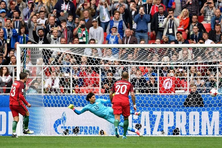 Portugal midfielder Adrien Silva sending Mexico goalkeeper Guillermo Ochoa the wrong way from the spot in extra time for a controversy-filled 2-1 win in the Confed Cup.